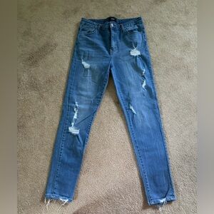 Deconstructed vervet skinny jeans